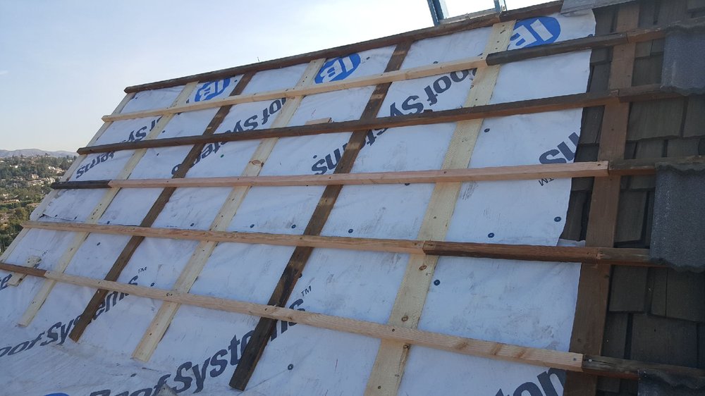 Slide of Ocean Roofing