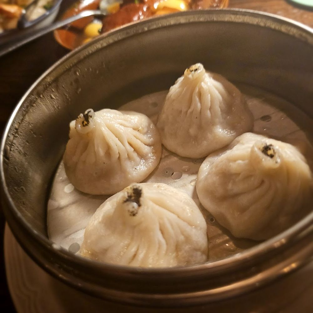 Nomad Tea Parlour - Chicken Truffle Soup Dumpling. Just OK. Truffle flavor was only in the overly thick outside. Only 4 for $15 - Chinese Near Me - New York, New York Nomad Tea Parlour - Chicken Truffle Soup Dumpling. Just OK. Truffle flavor was only in the overly thick outside. Only 4 for $15 - Chinese Near Me - New York, New York