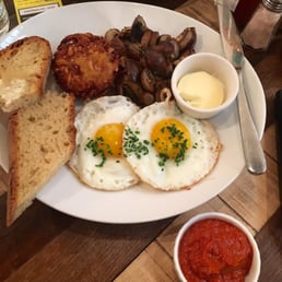 2 crispy fried eggs/sautéed mushrooms/thee best hash brown blob/fresh "ketchup"/fresh bread doused in plenty of butter. Sooo good!