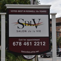Salon de la Vie - We are at the corner of Canton St. and Woodstock Rd.