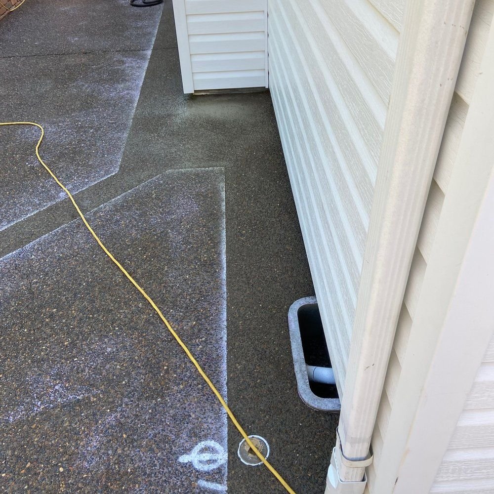 Slide of Family Drain Cleaning