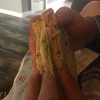 Jimmy John's - a person holding a sandwich - Sandwiches Near Me - Greenville, Texas Jimmy John's - a person holding a sandwich - Sandwiches Near Me - Greenville, Texas