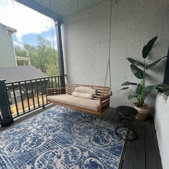 The Present Hotel - 2nd floor shared patio near the room. - Hotels Near Me - Savannah, Georgia