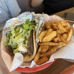 Beef & Lamb Gyros Wrap with a side of fries Beef & Lamb Gyros Wrap with a side of fries