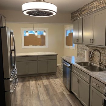 Marshall Contracting - a kitchen with stainless steel appliances - General Contractors Near Me Marshall Contracting - a kitchen with stainless steel appliances - General Contractors Near Me