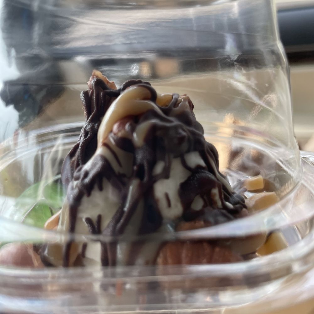 loves bakery - a hand holding a cupcake in a plastic container - Desserts Near Me - Memphis, Tennessee loves bakery - a hand holding a cupcake in a plastic container - Desserts Near Me - Memphis, Tennessee