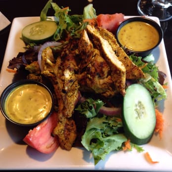 Market Street Inn - Arcadian spring mix salad with added jerk chicken - New American Near Me - Salisbury, Maryland Market Street Inn - Arcadian spring mix salad with added jerk chicken - New American Near Me - Salisbury, Maryland
