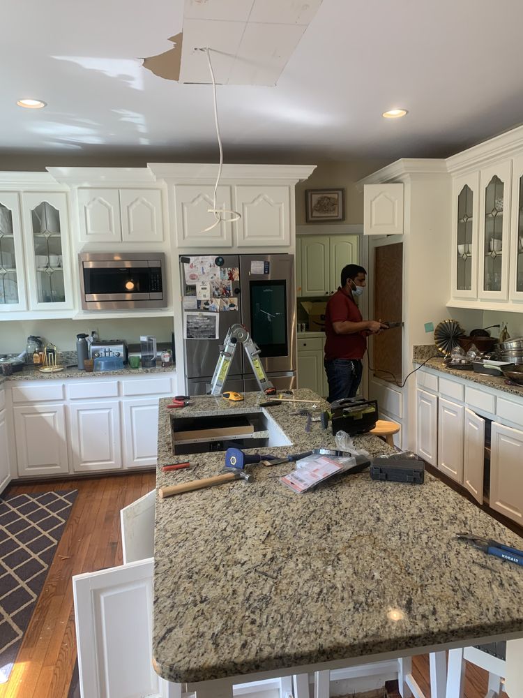 Slide of Ali Handyman