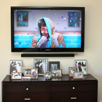 MG Audio Video Design - TV and SoundBar mounted on wall. - Home Theatre Installation Near Me MG Audio Video Design - TV and SoundBar mounted on wall. - Home Theatre Installation Near Me