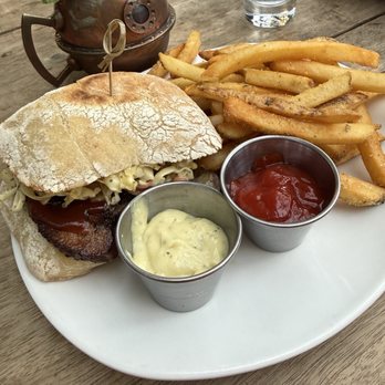 The Barrel Thief - BBQ Brisket sandwich with fries - Lounges Near Me - Seattle, Washington The Barrel Thief - BBQ Brisket sandwich with fries - Lounges Near Me - Seattle, Washington