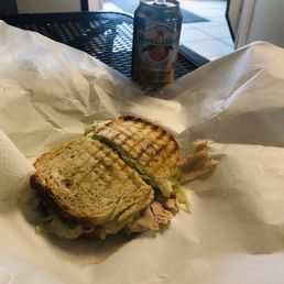 Half a Colombus sandwich with an orange San Pellegrino. Just $6.50.