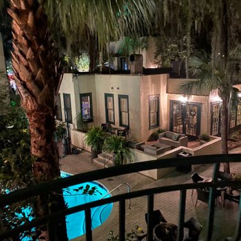 Village Inn & Pub - a view of the pool at night - Pubs Near Me - Saint Simons Island, Georgia Village Inn & Pub - a view of the pool at night - Pubs Near Me - Saint Simons Island, Georgia