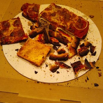 Rosati's Pizza - This is the burnt pizza they gave us for take out. Not just burnt to charcoal around edges, but cooked to leather underneath. - Pizza Near Me - Broomfield, Colorado