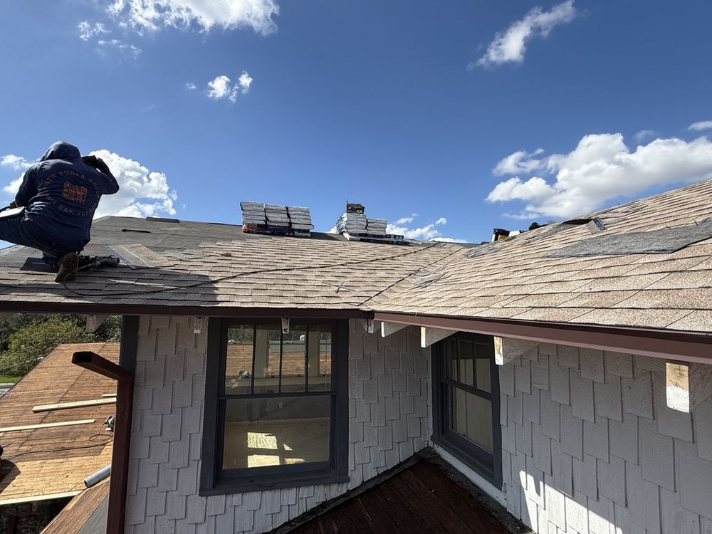 Slide of New Roofs Group