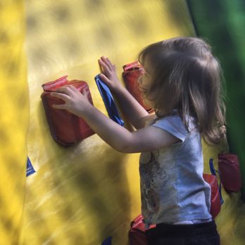 Oakfield Labor Daze - climbing in inflatable slide - Festivals Near Me - Oakfield, New York
