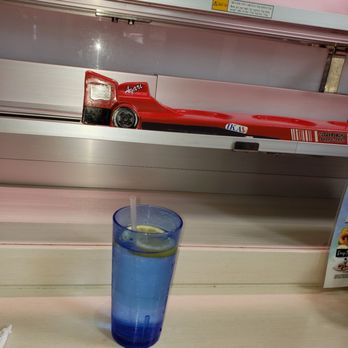 Genki Sushi - The race car tray - Sushi Bars Near Me - Waipahu, Hawaii Genki Sushi - The race car tray - Sushi Bars Near Me - Waipahu, Hawaii