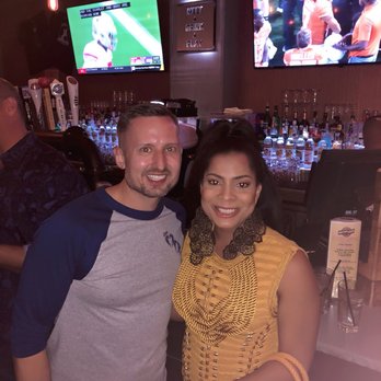 Meeting House Tavern - a man and a woman posing for a picture - Gay Bars Near Me - Chicago, Illinois