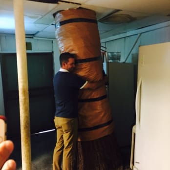 Roman's Oasis - Tree in the kitchen, rubber/oak tree. Ask about the story!! So darn funny, I almost fell off my stool. - Dive Bars Near Me - Goodyear, Arizona