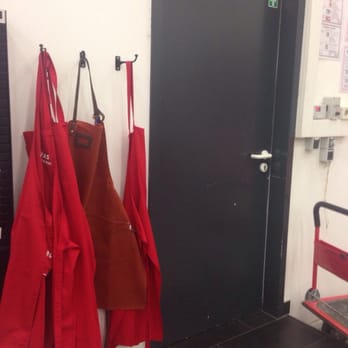 Andraschko Kaffee Manufaktur - Red aprons and the stuff office. - Coffee & Tea Supplies Near Me - Berlin, BE