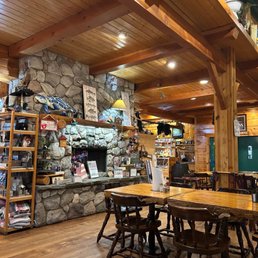 Shows fireplace and gift shop entrance. Shows fireplace and gift shop entrance.