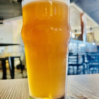 Throne Brewing - a glass of beer on a table - Breweries Near Me - Glendale, Arizona