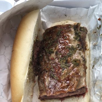 The Artisan Exchange - Skirt steak sandwich from Buenos Aires Empanada Bar with chimmichurri. - Farmers Market Near Me - West Chester, Pennsylvania The Artisan Exchange - Skirt steak sandwich from Buenos Aires Empanada Bar with chimmichurri. - Farmers Market Near Me - West Chester, Pennsylvania