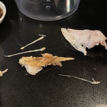 Sushi Zen - Bones and a fin from fried salmon - Sushi Bars Near Me - Beaverton, Oregon