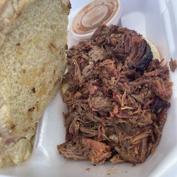 Lottie Bell's Bbq - a pulled pork sandwich with a side of coleslaw - Barbeque Near Me - Ormond Beach, Florida