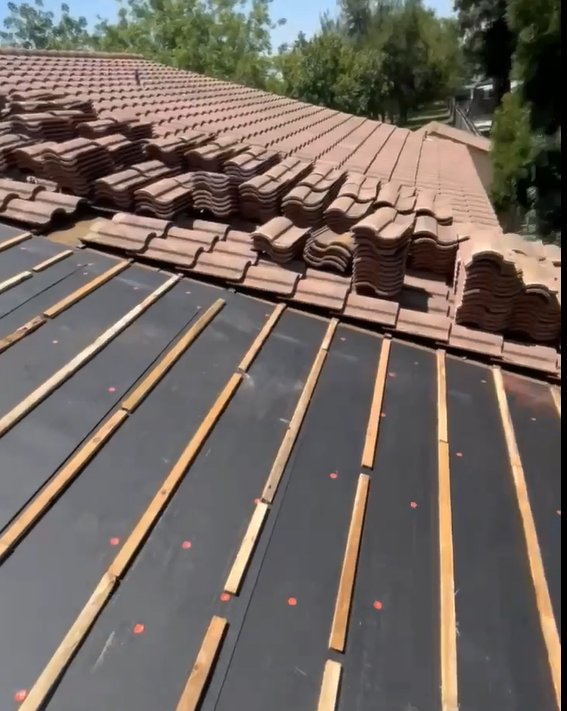 Slide of We Do Roofing