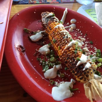 Amigos - Roasted corn with mild chili garlic aioli, cojita cheese and green onion - Mexican Near Me - Key West, Florida