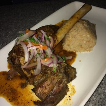 Puerto 27 Peruvian Kitchen & Pisco Bar - Seco de Cordero - lamb shank - Peruvian Near Me - Pacifica, California Puerto 27 Peruvian Kitchen & Pisco Bar - Seco de Cordero - lamb shank - Peruvian Near Me - Pacifica, California