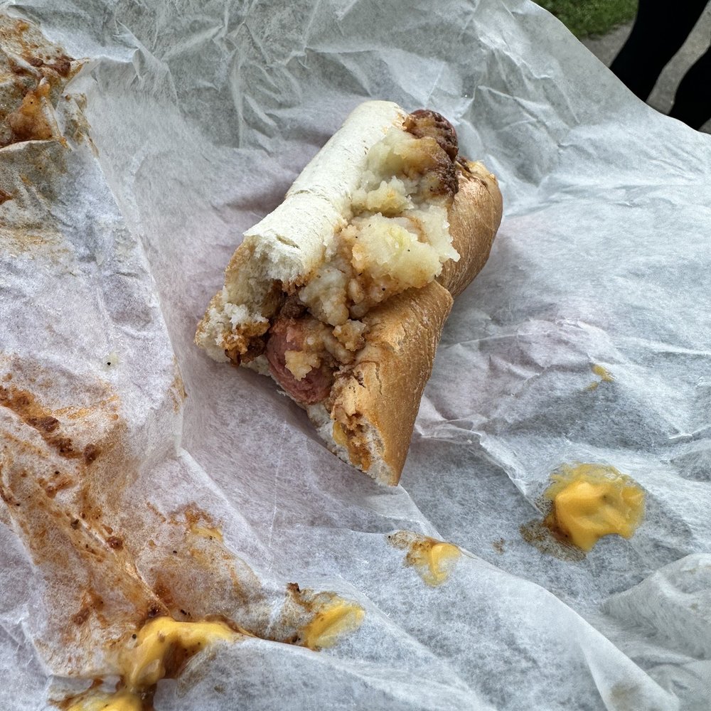 The Original Chris' Red Hots - half eaten hot dog - Food Trucks Near Me - Newark, New Jersey The Original Chris' Red Hots - half eaten hot dog - Food Trucks Near Me - Newark, New Jersey