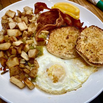 TJ's Restaurant & Lounge - Inn-Joyable breakfast. Two eggs, potatoes, choice of bacon or sausage, and toast - American Near Me - Youngstown, Ohio TJ's Restaurant & Lounge - Inn-Joyable breakfast. Two eggs, potatoes, choice of bacon or sausage, and toast - American Near Me - Youngstown, Ohio