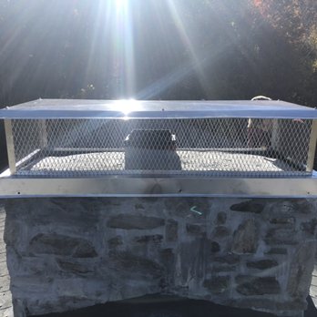 Elevation Chimney Services - This chimney had water intrusion problems, but we fixed it with a full sized stainless steel cap. - Chimney Sweeps Near Me - Asheville, North Carolina