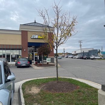 Subway - a car parked in front of a subway store - Sandwiches Near Me - Chester, Virginia