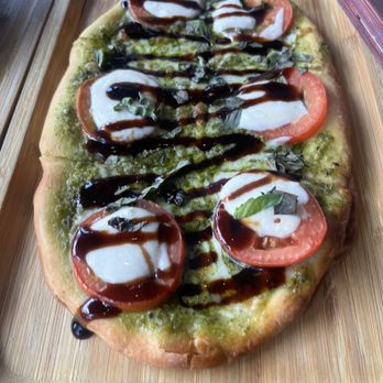 Tablas Woodstone Taverna - This flatbread was my favorite dish so light but flavorful and delicious! Tomato, Basil, Pesto & Mozzarella - Tapas/Small Plates Near Me - Mill Creek, Washington Tablas Woodstone Taverna - This flatbread was my favorite dish so light but flavorful and delicious! Tomato, Basil, Pesto & Mozzarella - Tapas/Small Plates Near Me - Mill Creek, Washington