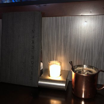 Yard House - Dublin mule drink with the nice ambience candle & menu. - New American Near Me - Austin, Texas Yard House - Dublin mule drink with the nice ambience candle & menu. - New American Near Me - Austin, Texas