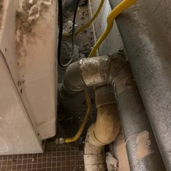 Mays Landing Campground - Dust and lint behind the laundry. Fire hazard?