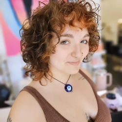 Two Zero Eight Salon - We love seeing natural curly hair do what it does best with the right haircut!