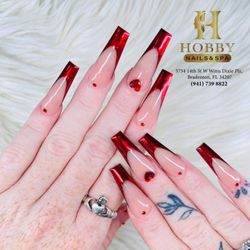 Hobby Nails And Spa - Red hot nails for a fiery mood! Loving these glazed French tips.