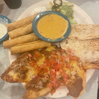 Chuy's - Sampler platter with taquitos, quesadillas, pancho nachos, & queso - Tex-Mex Near Me - Lutz, Florida