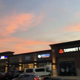 a parking lot at sunset