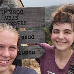Dorr Mountain Summit - This is my partner and I at the Summit in front of the marker post.