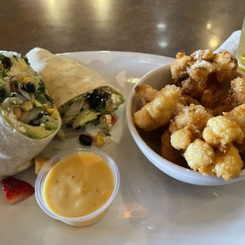 Sahm's Place - Avocado Wrap with fried cauliflower - American Near Me - Indianapolis, Indiana Sahm's Place - Avocado Wrap with fried cauliflower - American Near Me - Indianapolis, Indiana