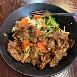Teriyaki pork bowl with brown rice and vegetables Teriyaki pork bowl with brown rice and vegetables