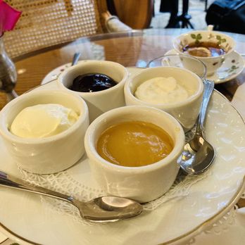 Le Salon - Devonshire Cream, Lemon Curd, Mixed Berry Preserves and whipped cream - Tea Rooms Near Me - New Orleans, Louisiana Le Salon - Devonshire Cream, Lemon Curd, Mixed Berry Preserves and whipped cream - Tea Rooms Near Me - New Orleans, Louisiana