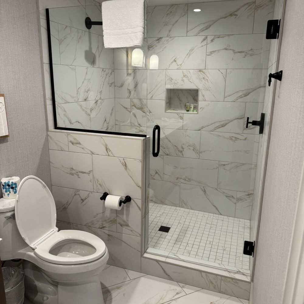 Nice big new shower and new toilet Nice big new shower and new toilet