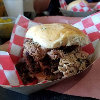 B-Daddy's BBQ - "Big Daddy" sandwich. Chopped brisket, pulled pork, sausage link. Best $10 I've spent in a LONG time, if not ever. - Barbeque Near Me - Helotes, Texas B-Daddy's BBQ - "Big Daddy" sandwich. Chopped brisket, pulled pork, sausage link. Best $10 I've spent in a LONG time, if not ever. - Barbeque Near Me - Helotes, Texas