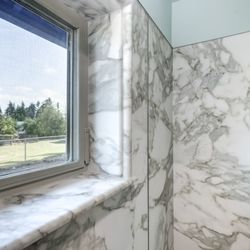 Square Deal Construction - Tyvarian Surfaces are easy-to-clean and with over 100 beautiful colors to choose from.