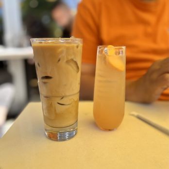 OEB Breakfast Co. - Yaletown - 7/5/2024 Cafe Latte (left) and Peach Paradise (happy hour morning edition 2024; right) - Breakfast & Brunch Near Me - Vancouver, British Columbia OEB Breakfast Co. - Yaletown - 7/5/2024 Cafe Latte (left) and Peach Paradise (happy hour morning edition 2024; right) - Breakfast & Brunch Near Me - Vancouver, British Columbia